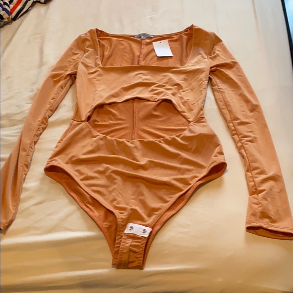 Stylish orange color shoes your belly